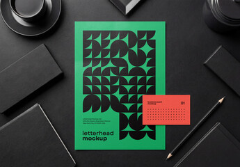 Template Mockup Letterhead and Business Card Branding on Black Workspace