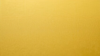 Fototapeta premium Plain yellow textured surface with a smooth finish.