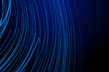Obraz premium Elegant blue light streaks flowing on a dark abstract background with glow effects.