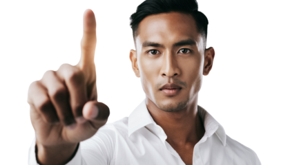 Professional man pointing finger to interact with virtual screen in studio