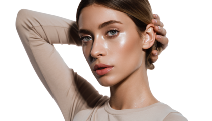 Close-up portrait of a young woman showcasing natural beauty and radiant skin in studio