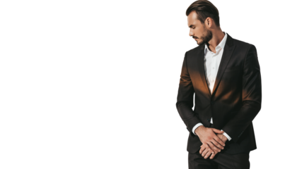 Stylish professional man in elegant dark suit posing thoughtfully in studio portrait