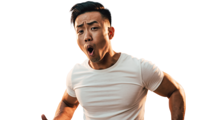 Surprised young Asian man with mouth open, reacting with shock and disbelief.