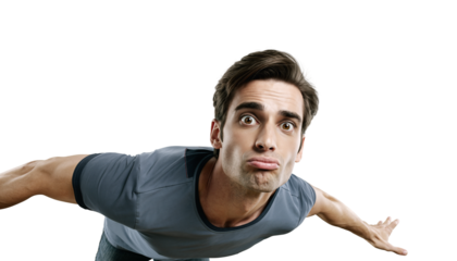 Playful young adult man with a funny pouting face making a surprised expression against a black background