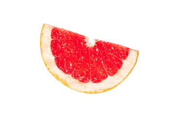 A slice of red grapefruit is shown on a white background