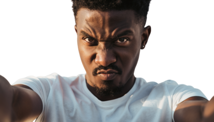 Young adult male showing intense anger in a close-up, powerful selfie portrait