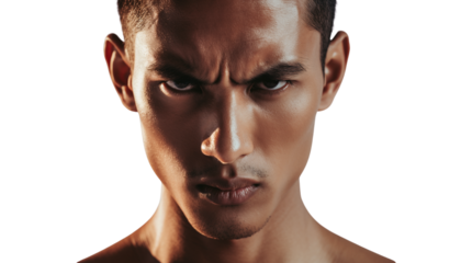Intense gaze of a furious young man in a powerful studio portrait