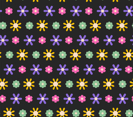Seamless pattern of colorful cute daisy flower rows on black background for textile or wallpaper design