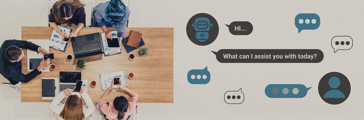 A diverse group of professionals collaborates around a modern office table, engaging in digital...