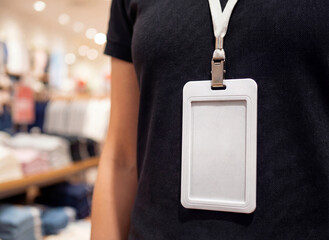 Vertical ID Badge Mockup Close Up on Saleswoman with Polo Shirt
