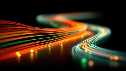 Light trails create a colorful pattern on a dark background during late night hours in a creative space