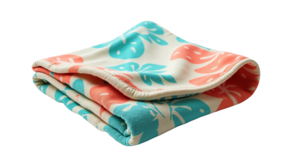 Folded tropical print baby blanket featuring coral and turquoise monstera leaves for product display