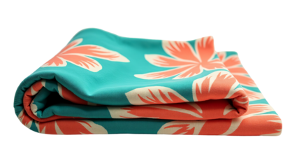 Folded tropical floral patterned beach towel featuring vibrant coral hibiscus flowers on a bright turquoise background on black