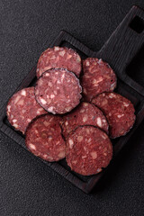 Black blood pudding, grilled pork sausage cooked for dinner. Blood pudding