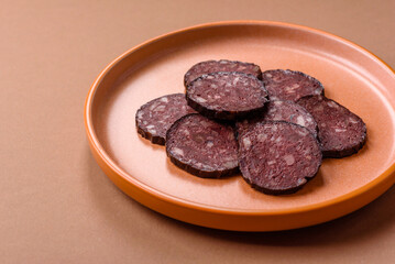 Black blood pudding, grilled pork sausage cooked for dinner. Blood pudding