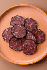 Black blood pudding, grilled pork sausage cooked for dinner. Blood pudding