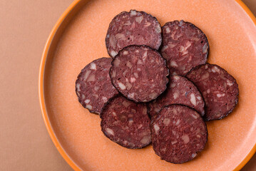 Black blood pudding, grilled pork sausage cooked for dinner. Blood pudding