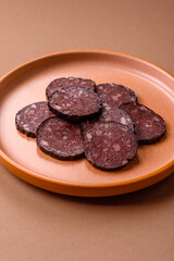 Black blood pudding, grilled pork sausage cooked for dinner. Blood pudding