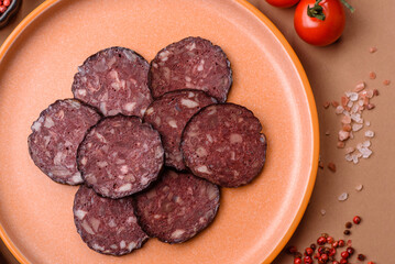 Black blood pudding, grilled pork sausage cooked for dinner. Blood pudding