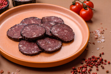 Black blood pudding, grilled pork sausage cooked for dinner. Blood pudding