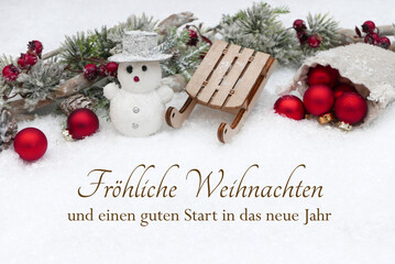 Weihnachtskarte mit Grüßen in deutscher Sprache: Dekoration mit Christbaumkugeln,...