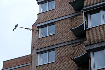 Unique building with a curious antenna on its wall