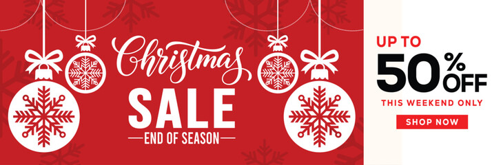 Festive Christmas sale banner with hanging snowflake ornaments, bold holiday typography and promotional text offering up to 50 percent discount on red background, ideal for seasonal retail advertising © bibin