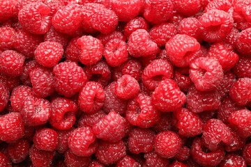 Fresh ripe raspberries as background, top view