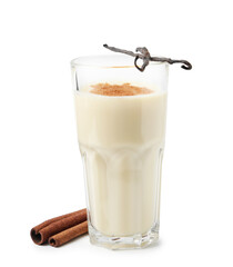 Delicious protein shake in glass, cinnamon and vanilla pods isolated on white