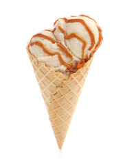 Tasty ice cream with caramel sauce in waffle cone isolated on white