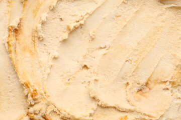 Tasty vanilla ice cream as background, closeup