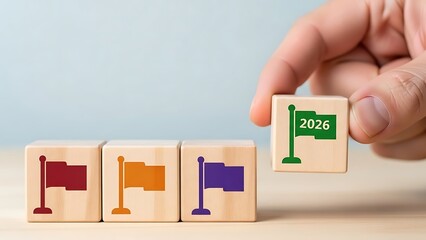 Setting 2026 goal represented by a green flag on a wooden cube
