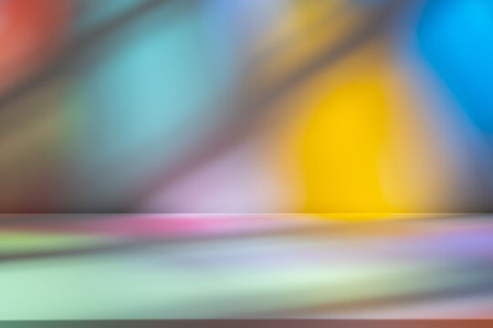 Background with colorful reflections and shadows. Stained glass lights.