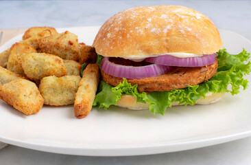 veggie burger  with veggie fries and tots