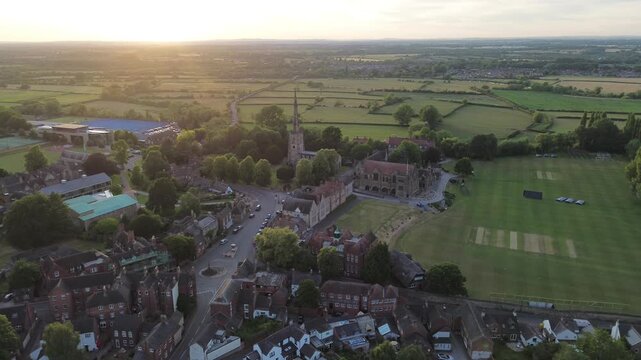 aerial view of Repton in Derbyshire, revealing the historic village layout, surrounding countryside, rooftops, roads, and green spaces within the rural English landscape