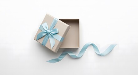 An elegant top-down view of a beige open gift box tied with a delicate blue ribbon unfurling onto a clean white background, symbolizing surprise and thoughtful giving