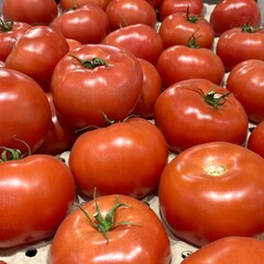 Red tomatoes in the store shop market supermarket