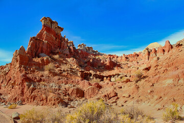 Fototapeta premium Stunning Red Layers on the Hoodoos at Gooseberry Badlands Recreation Area in Central Wyoming in Autumn.