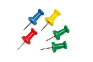 Colorful pushpins lying on transparent background, close-up product shot.