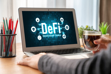 Decentralized finance or DeFi concept on modish computer screen . The defi system give new choice of investment and money saving .