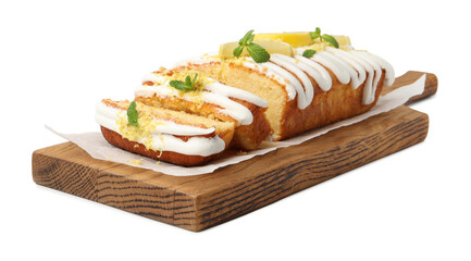 Delicious lemon cake with glaze, fresh fruit slices and mint isolated on white