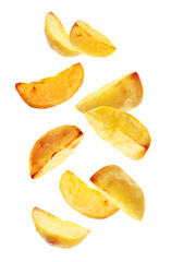 Baked potato wedges falling on white background