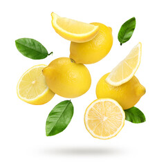Fresh lemons and green leaves falling on white background