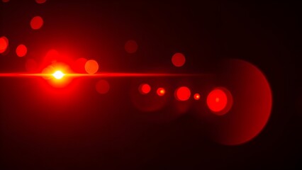 Bright red light source with horizontal lens flare and bokeh elements against a black background