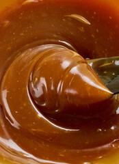 freshly cooked caramel sauce background