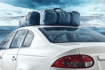 Traveling to Winter Holiday Destination With Luggage on Car Roof on Snowy Landscape