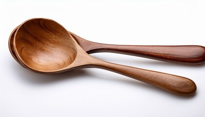a pair of elegant wooden serving utensils featuring a rounded spoon and a fork isolated on a white background perfect for kitchen or dining table use