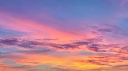 Obraz premium Vibrant pastel sunset or sunrise sky with dramatic colorful clouds