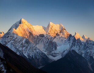 snowy peaks of meili snow mountain range kawagebo yunnan china at sunrise with warm golden light illuminating the sharp rugged snow capped peaks against a clear sky