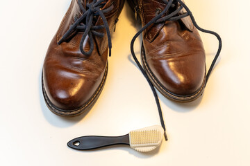 Cleaning Brown Leather Shoes with Brush – Footwear Care, Shoe Maintenance and Polishing at Home, Mens Style and Grooming Concept